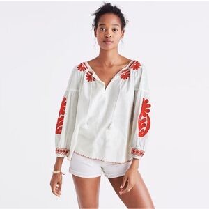 *Madewell* blouse with red floral accents